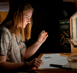 Teen experimenting with light